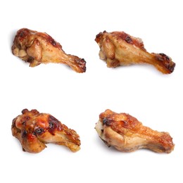 Set with tasty roasted chicken wings on white background