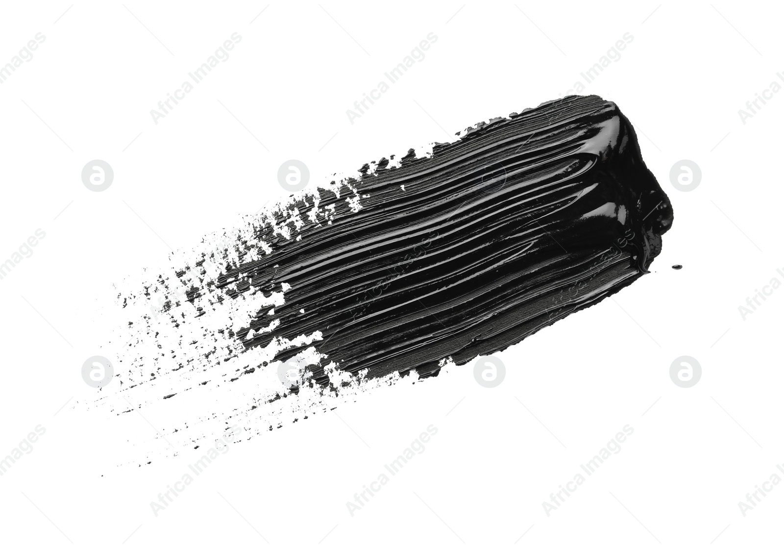 Photo of Brushstroke of black oil paint on white background, top view