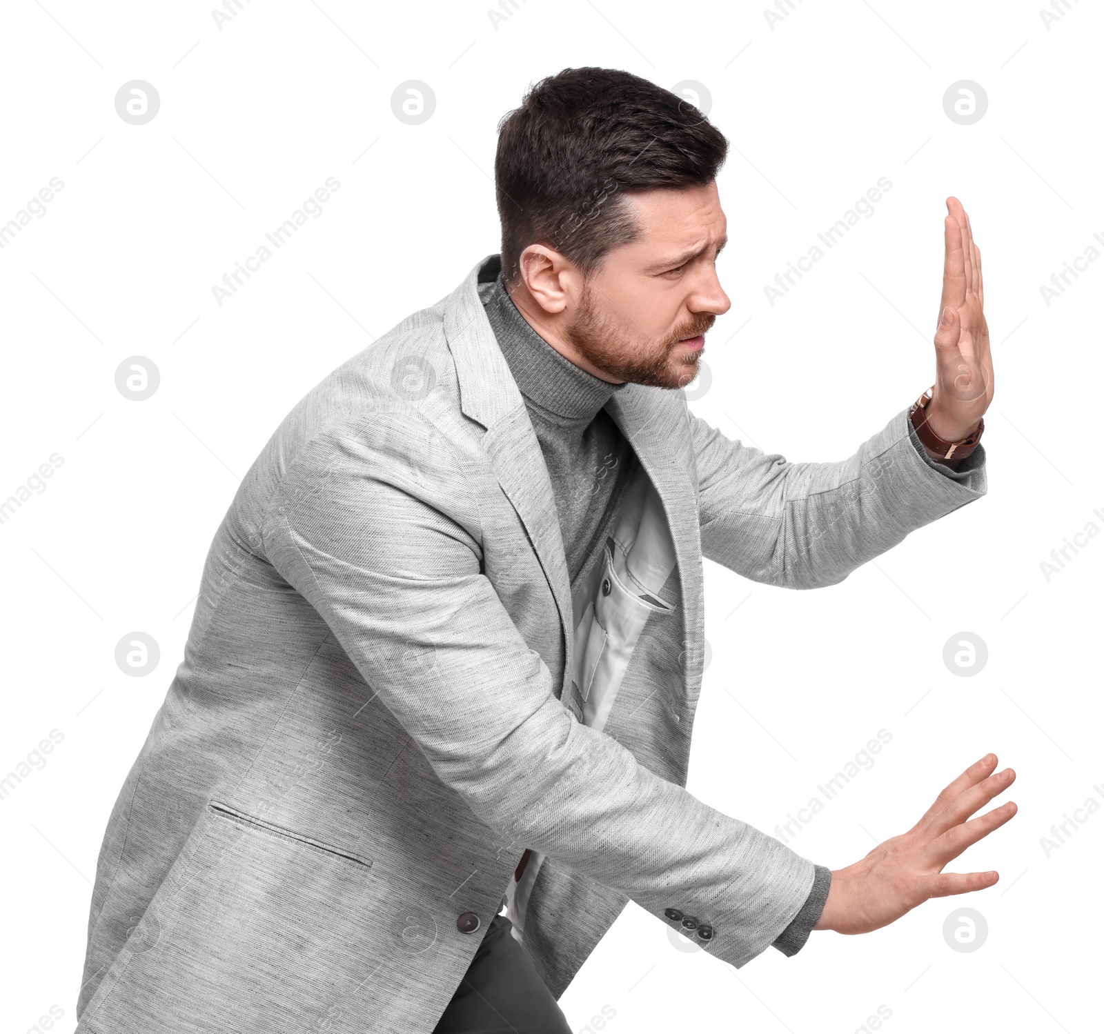 Photo of Handsome bearded businessman in suit on white background