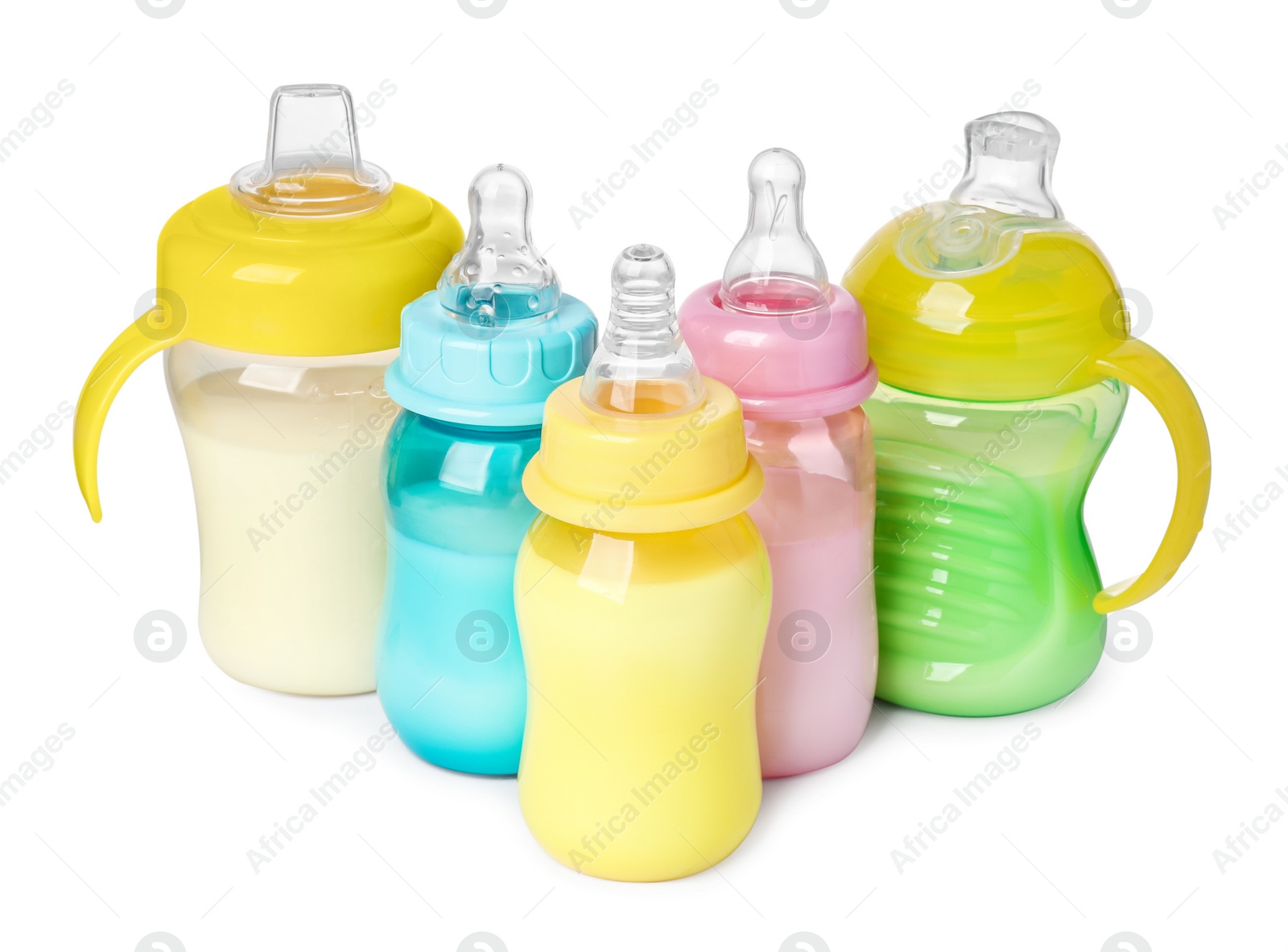 Photo of Feeding bottles with milk on white background