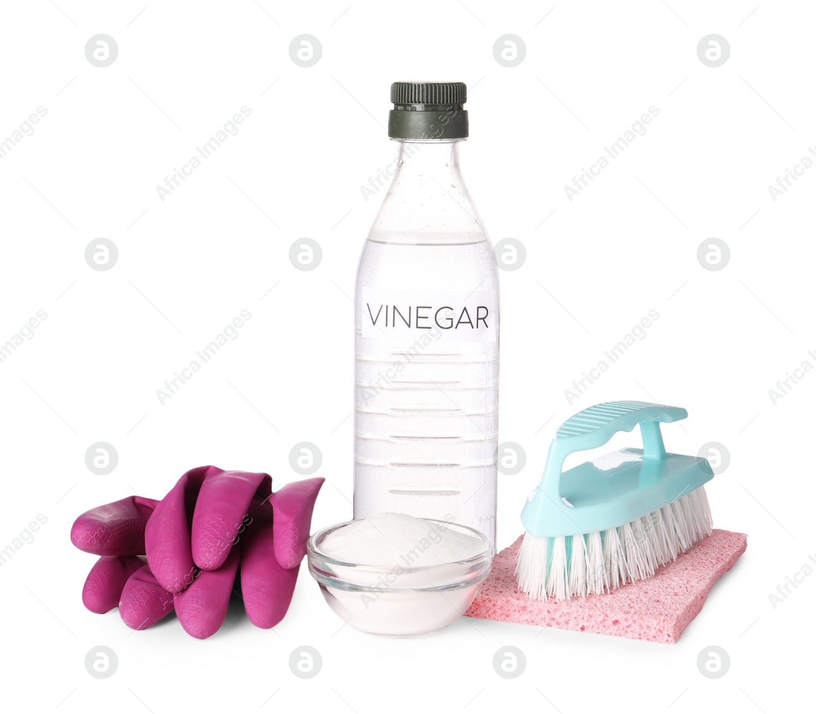 Photo of Eco friendly natural cleaners. Vinegar in bottle, sponge, brush, bowl of soda and gloves isolated on white