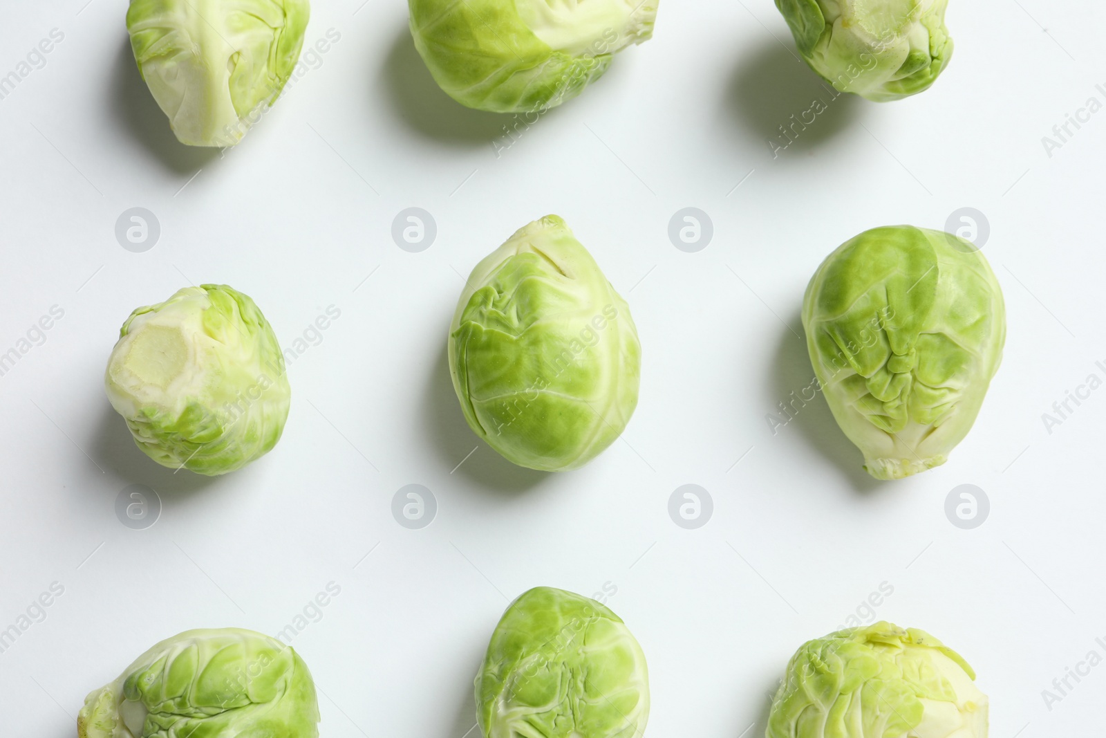 Photo of Tasty fresh Brussels sprouts on white background, top view