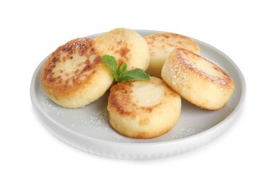 Photo of Delicious cottage cheese pancakes with mint and icing sugar isolated on white