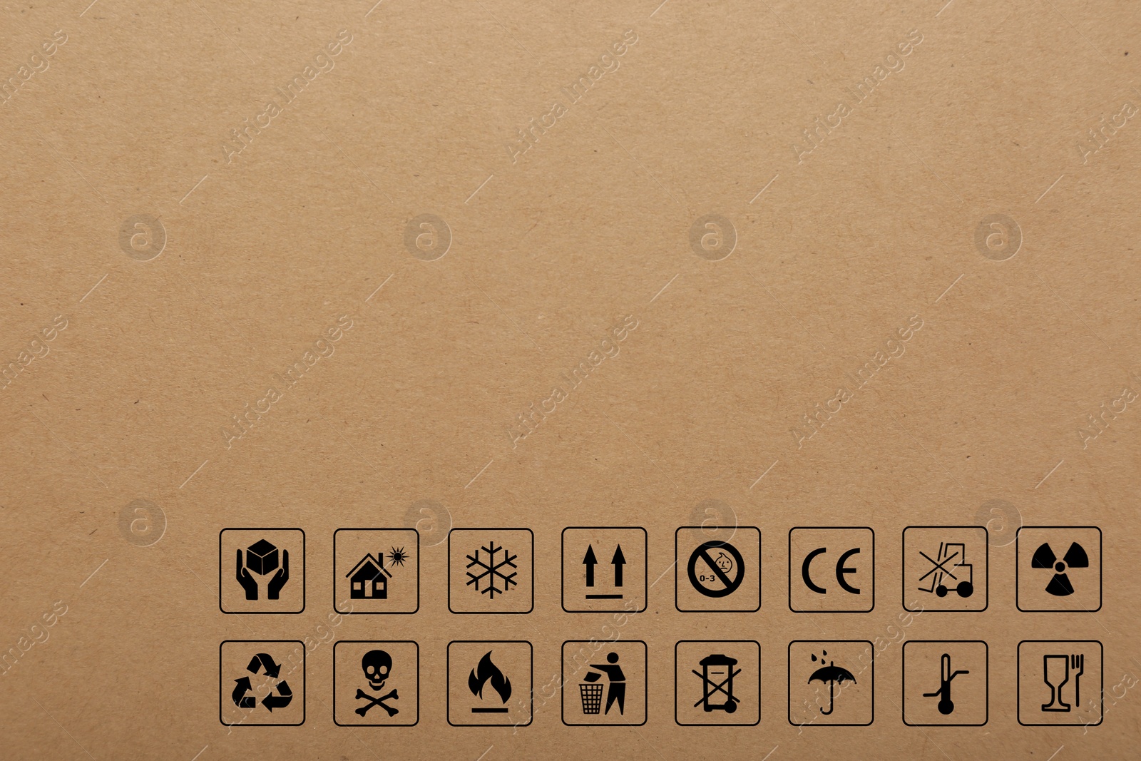 Image of Cardboard box with packaging symbols as background, closeup