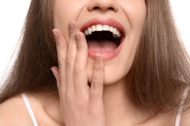 Young woman with beautiful smile, closeup. Teeth whitening