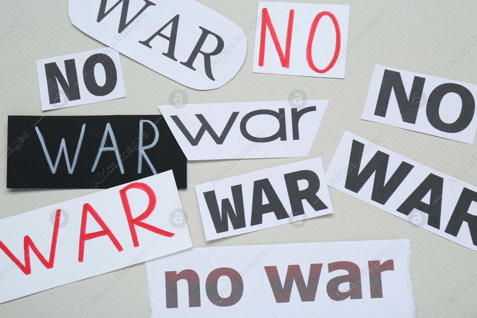 Photo of No War concept. Composition with many cards on light grey background, flat lay