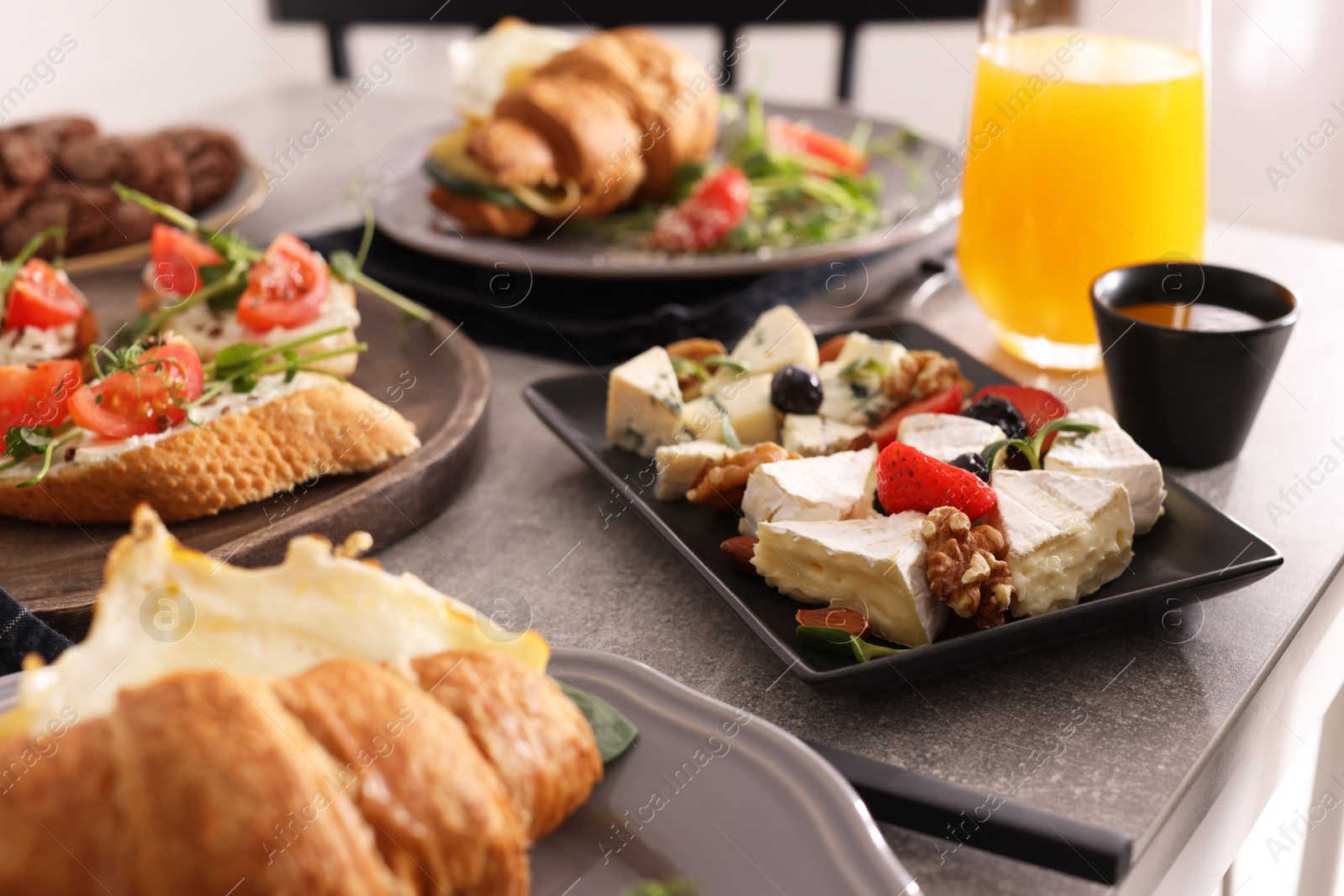 Photo of Many different dishes served on buffet table for brunch