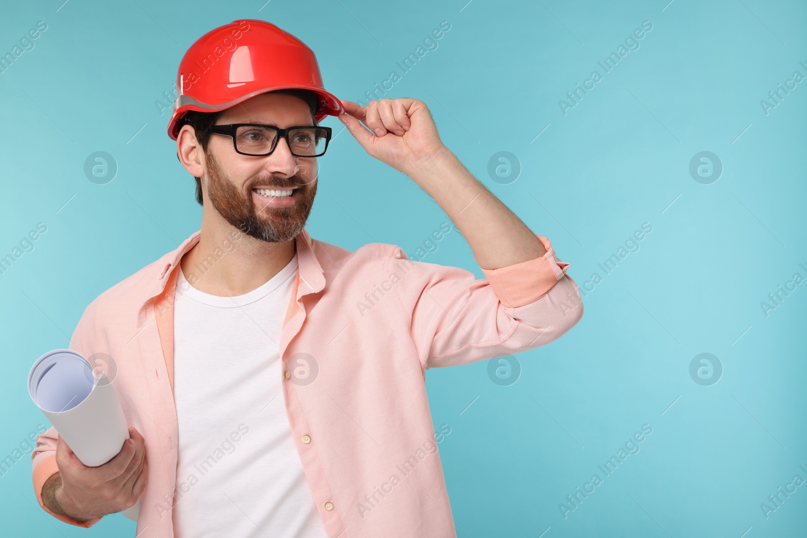 Photo of Architect in hard hat with draft on light blue background, space for text