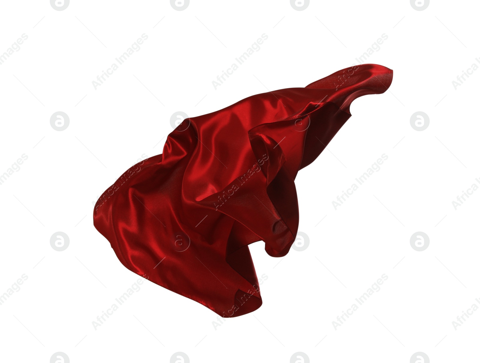 Photo of Beautiful delicate red silk floating on white background