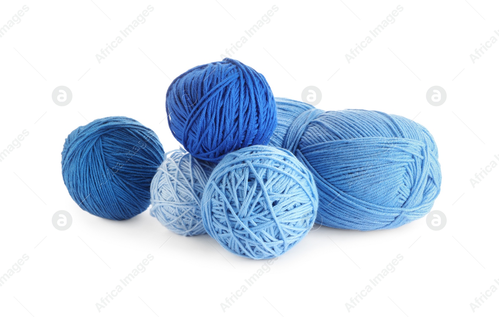 Photo of Soft colorful woolen yarns on white background