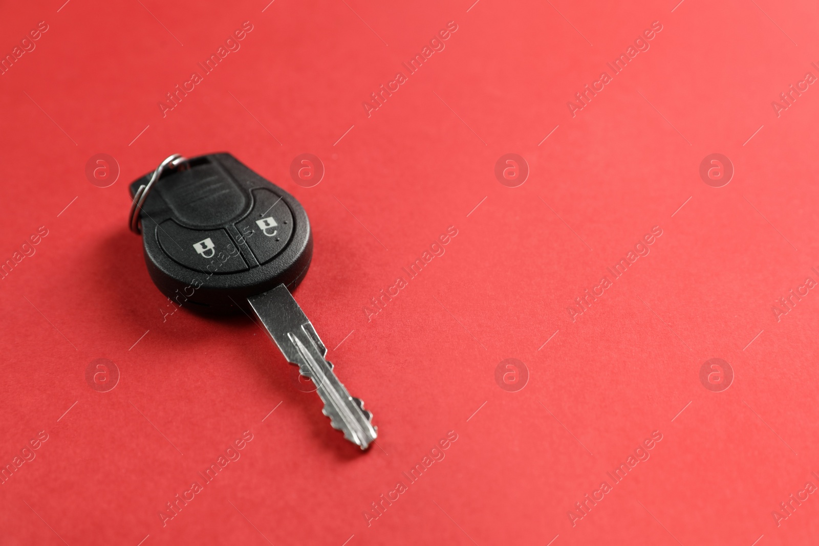 Photo of Car key on color background. Space for text