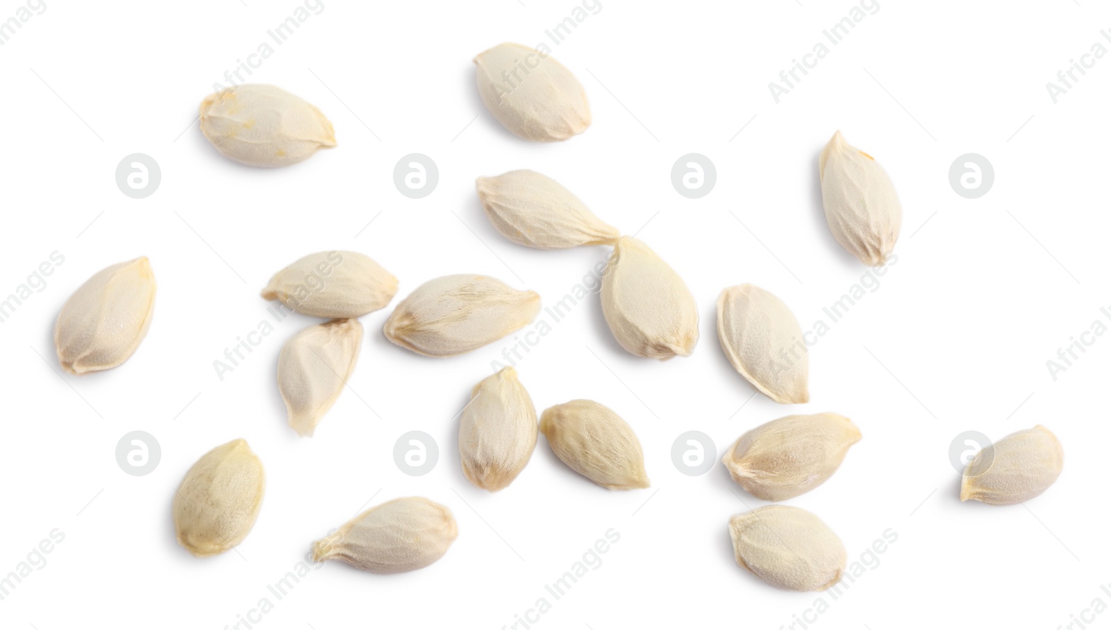 Photo of Many seeds of tangerine isolated on white, top view