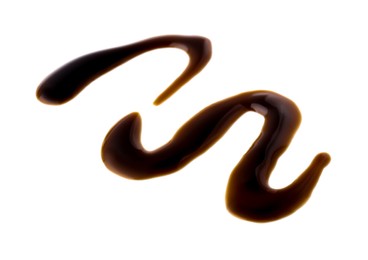 Photo of Balsamic glaze on white background. Salad dressing