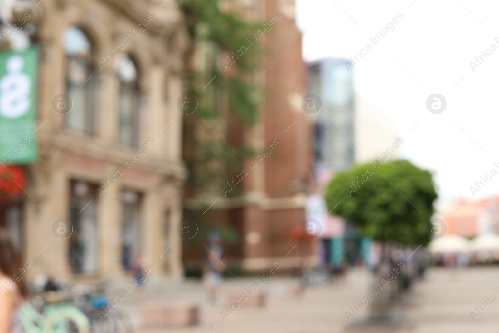 Photo of Blurred view of city street on sunny day