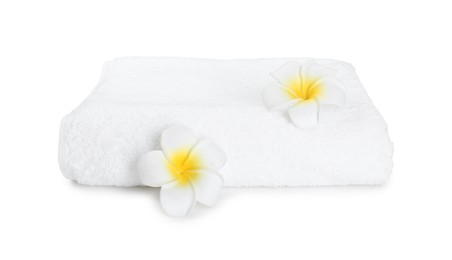 Terry towel and plumeria flowers isolated on white