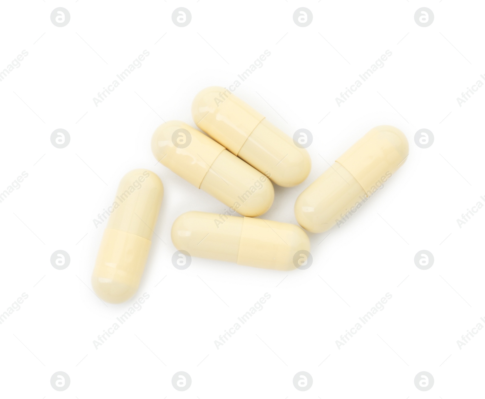 Photo of Vitamin capsules isolated on white, top view. Health supplement