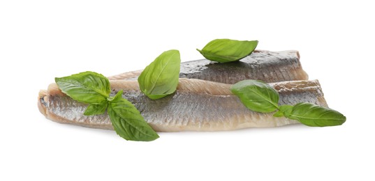 Delicious salted herring fillets with basil on white background