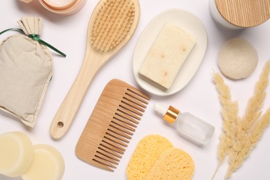 Bath accessories. Different personal care products and dry spikelets on white background, flat lay