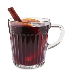 Photo of Aromatic mulled wine in glass cup isolated on white