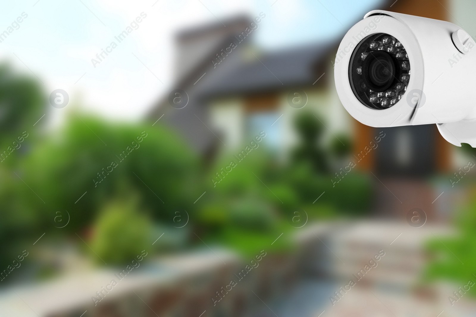 Image of Home security system. House under CCTV camera surveillance