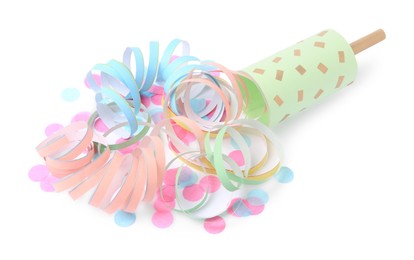 Photo of Colorful confetti and streamers with bright party cracker isolated on white, above view