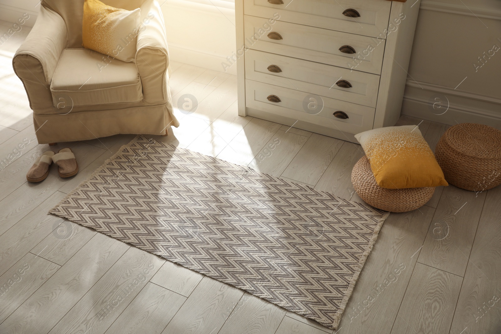 Photo of Modern room interior with stylish rug and furniture, above view