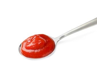 Photo of Tasty ketchup with spoon isolated on white. Tomato sauce
