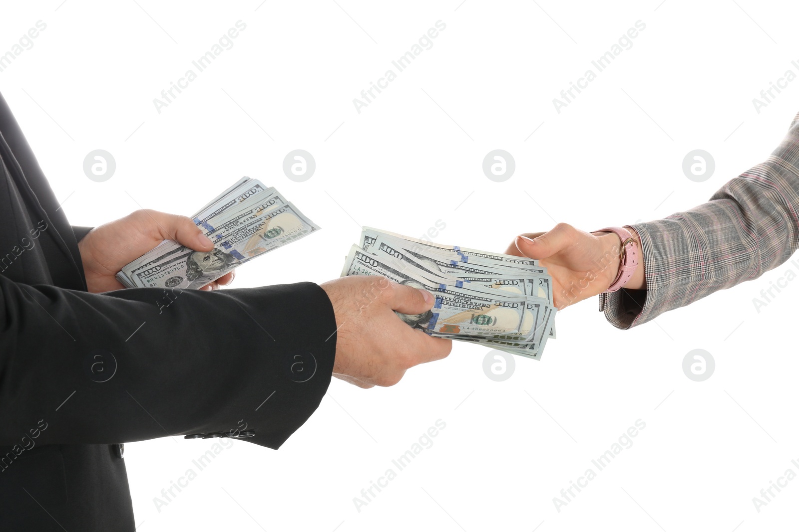 Photo of Man giving bribe money to woman on white background, closeup of hands