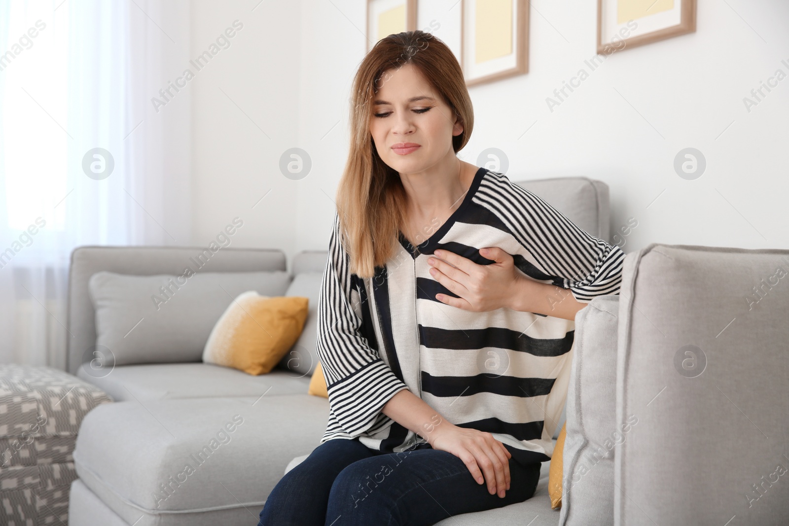 Photo of Woman having heart attack at home