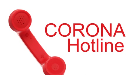 Image of Covid-19 Hotline. Red handset and text on white background, banner design 