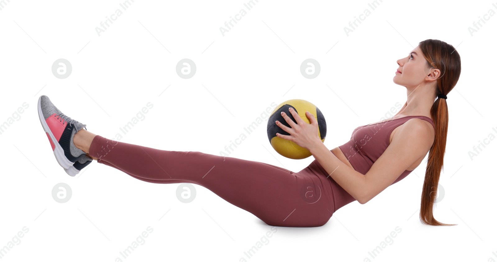 Photo of Athletic woman doing exercise with medicine ball isolated on white