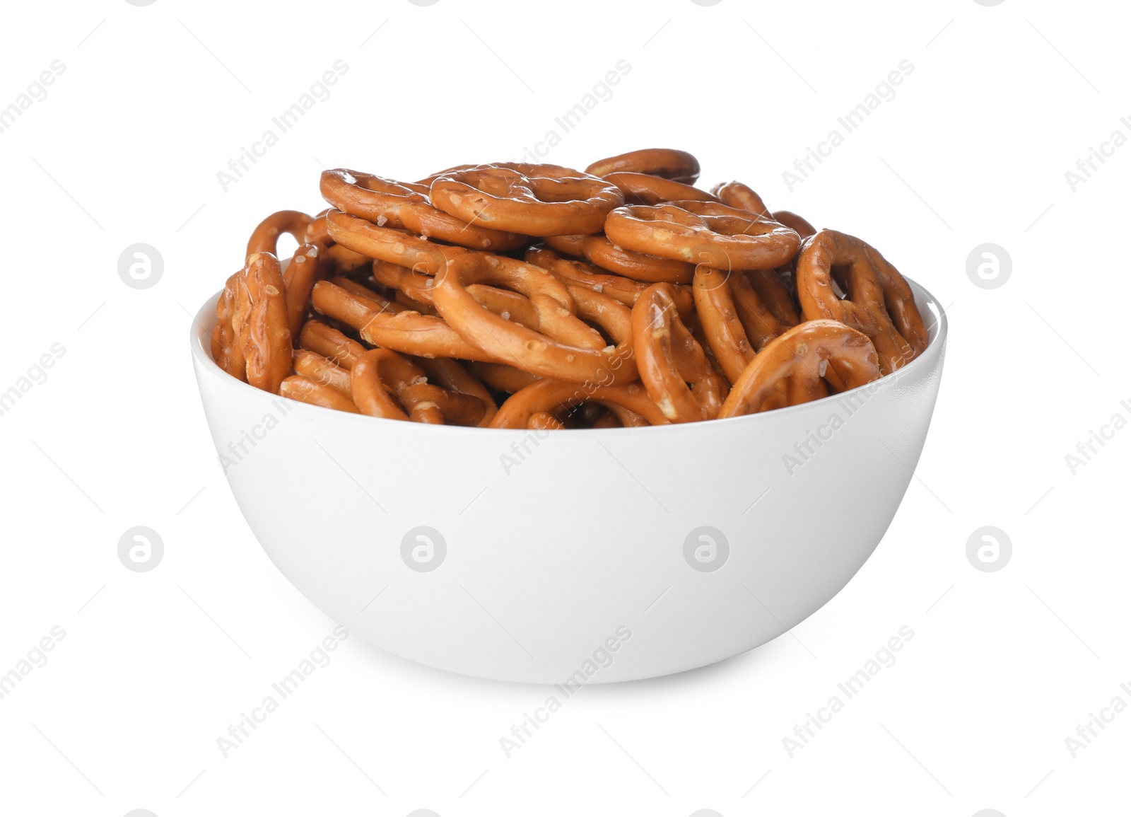 Photo of Delicious pretzel crackers in bowl isolated on white