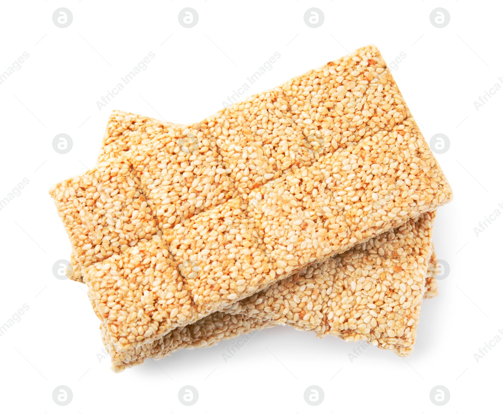 Photo of Delicious sesame kozinaki bars on white background, top view