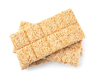 Photo of Delicious sesame kozinaki bars on white background, top view