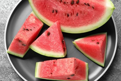 Photo of Delicious fresh watermelon slices on table, closeup