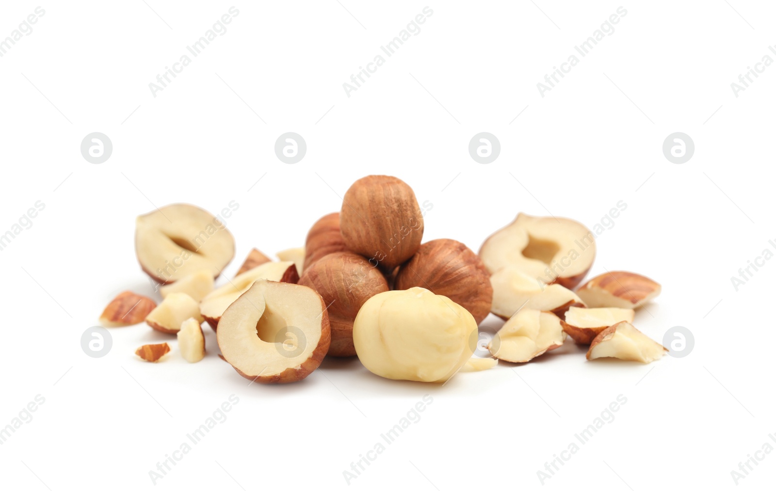 Photo of Heap of tasty hazelnuts on white background