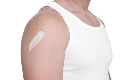 Photo of Man with sun protection cream on his shoulder against white background, closeup