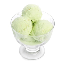 Photo of Dishware of sweet pistachio ice cream on white background