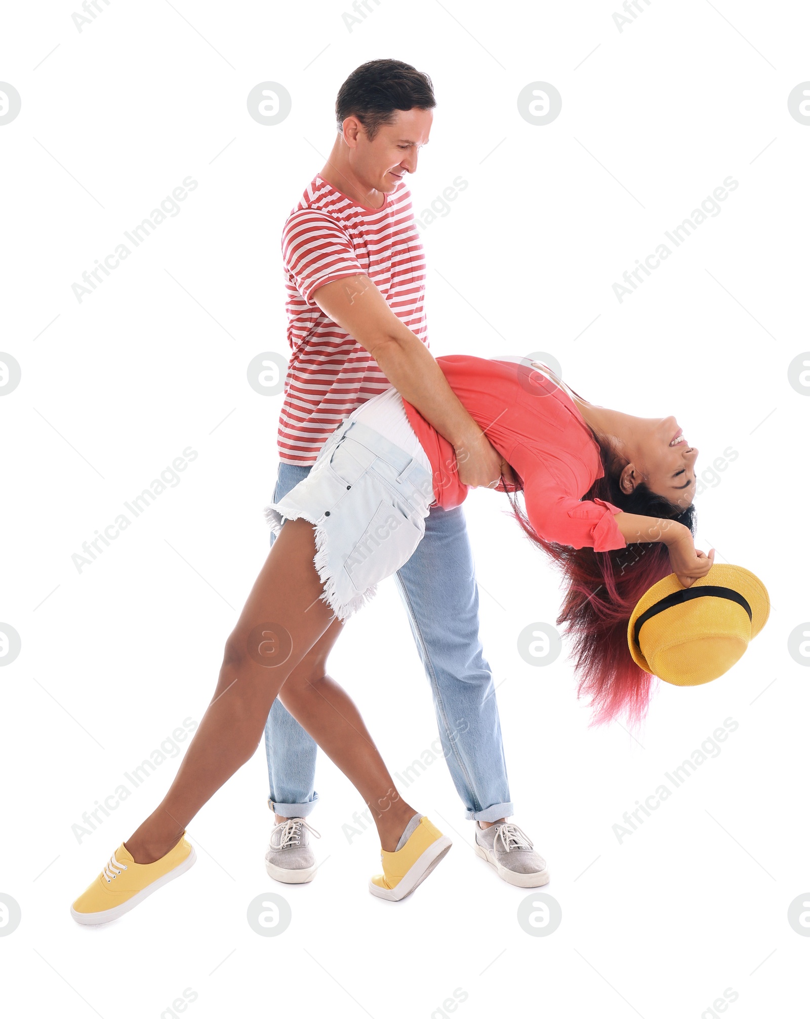 Photo of Beautiful lovely couple dancing on white background