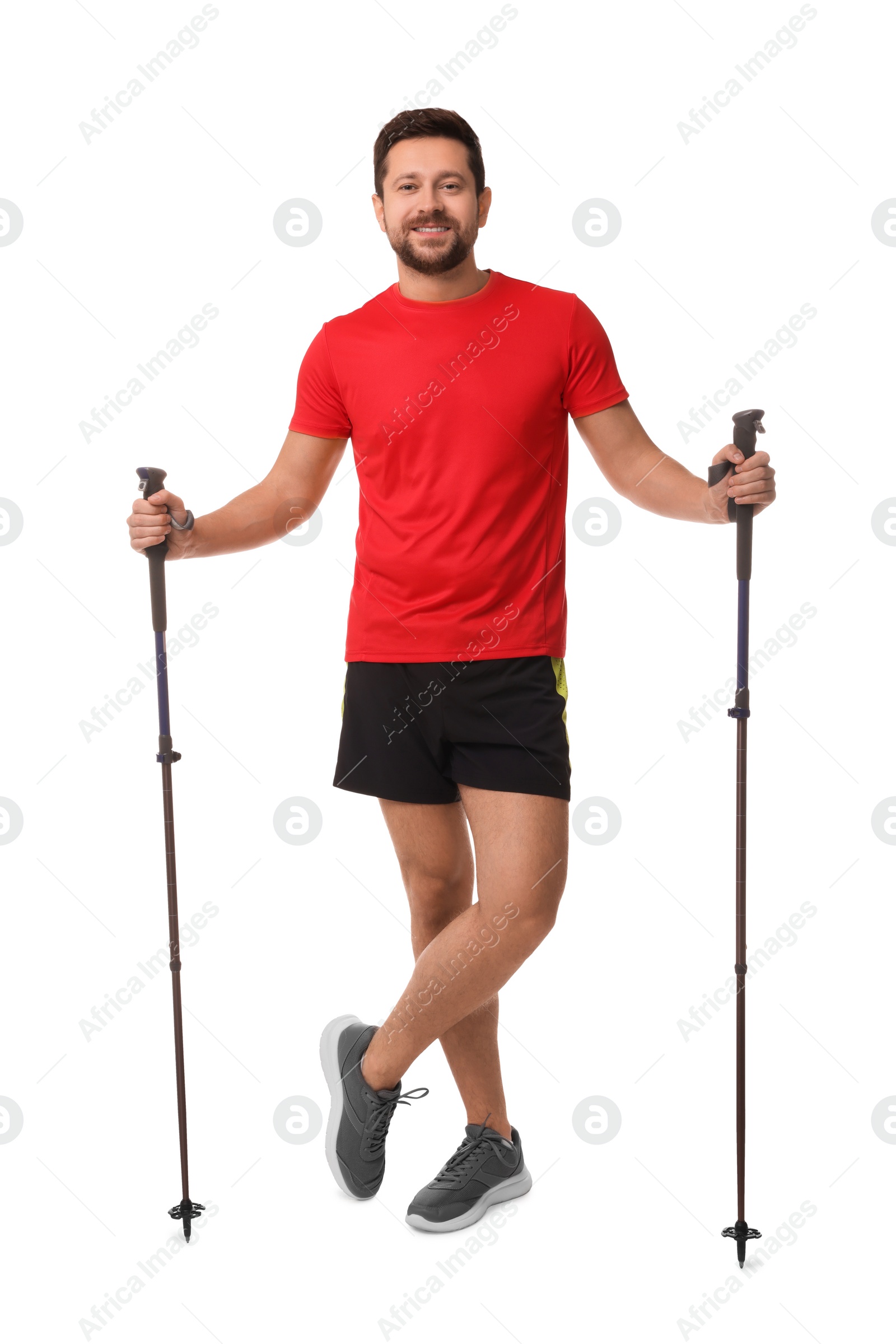 Photo of Man with poles for Nordic walking isolated on white