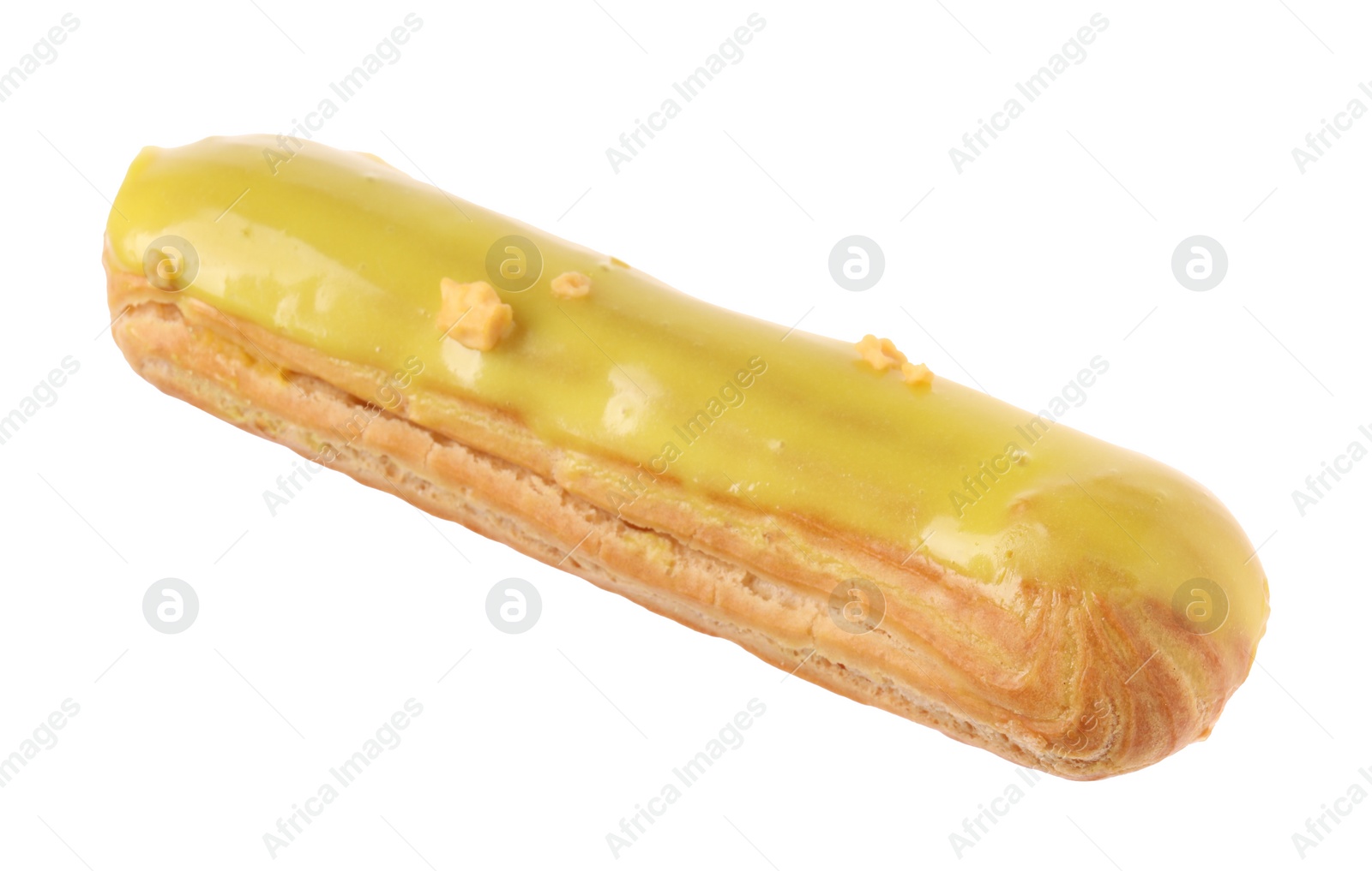 Photo of Delicious eclair covered with yellow glaze isolated on white