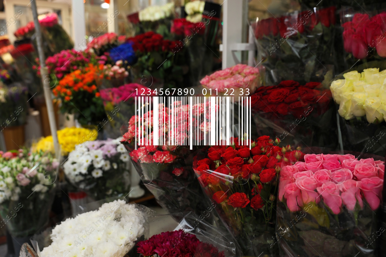 Image of Barcode and beautiful fresh flowers at wholesale market