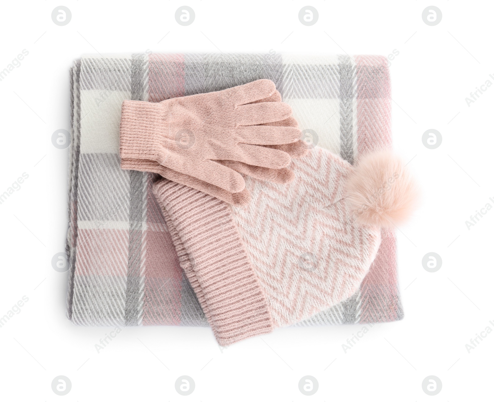 Photo of Woolen gloves, scarf and hat on white background, top view
