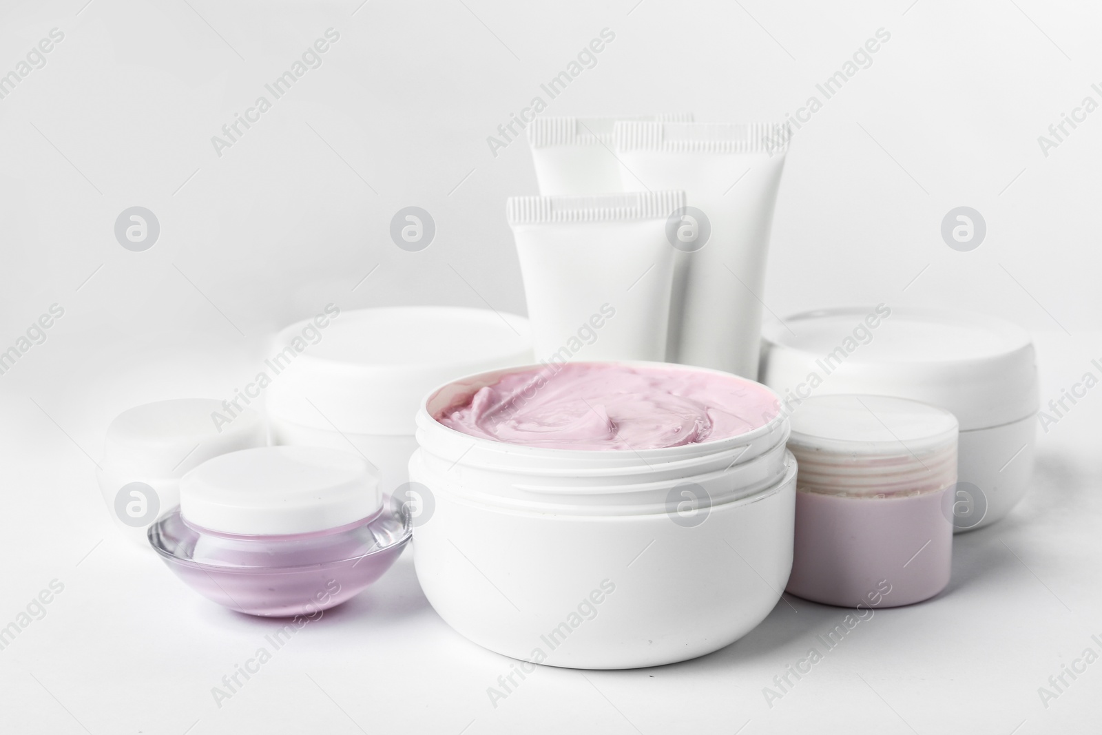 Photo of Different body care products on white background