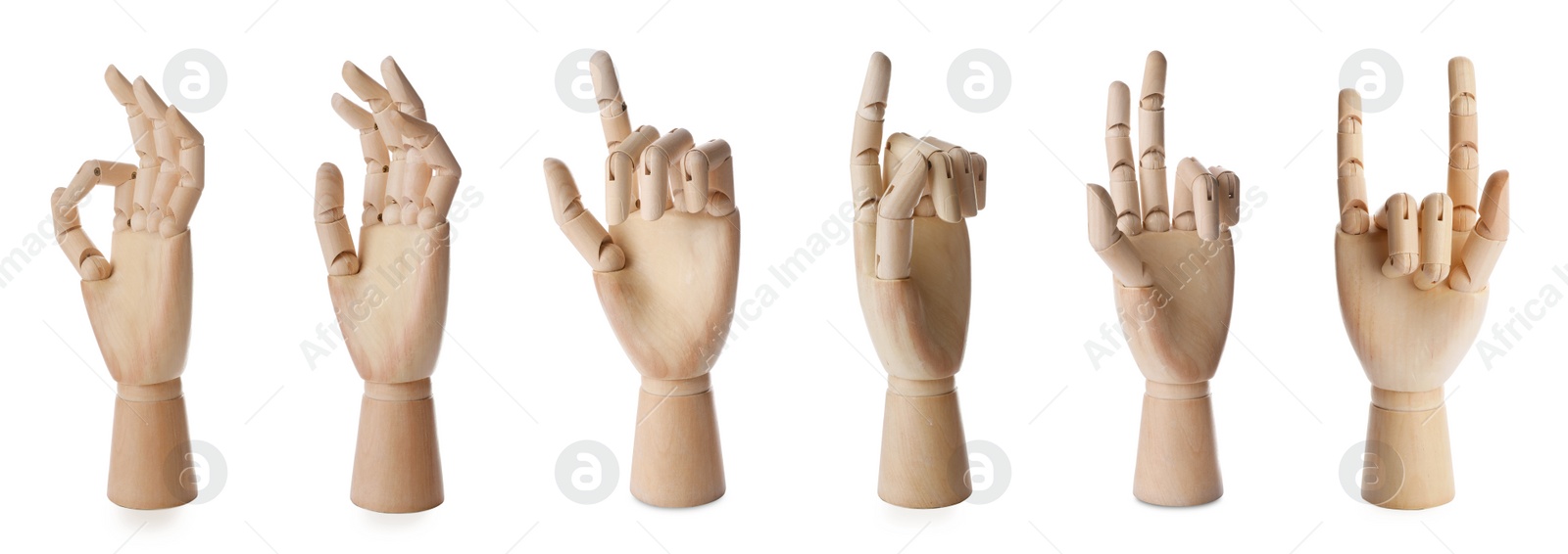 Image of Set with wooden hands of mannequins showing different gestures on white background. Banner design