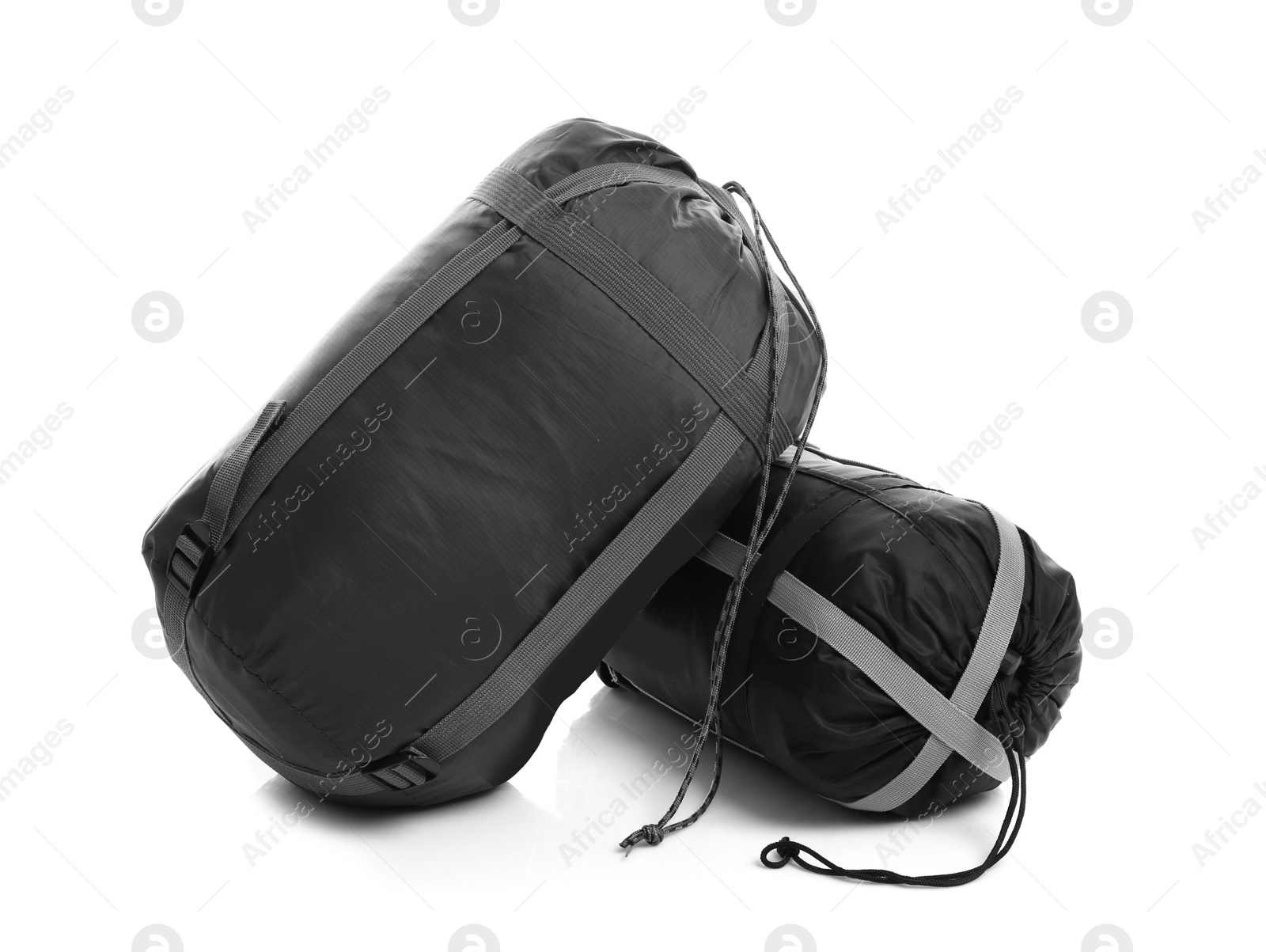 Photo of Sleeping bags on white background. Camping equipment