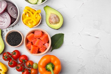 Photo of Ingredients for poke bowl on white textured table, flat lay. Space for text