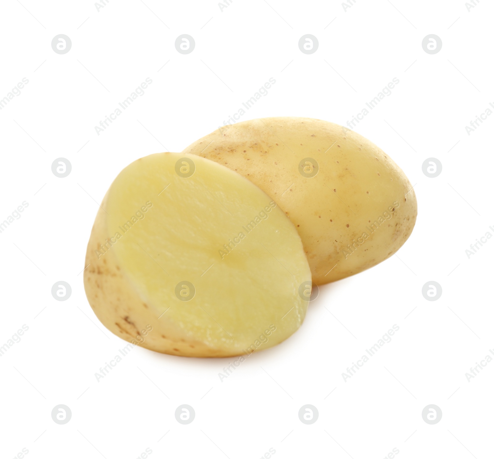 Photo of Whole and cut fresh raw organic potatoes on white background