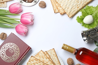 Photo of Flat lay composition with symbolic Passover (Pesach) items on white background, space for text