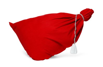 Photo of Merry Christmas. Santa Claus red bag isolated on white